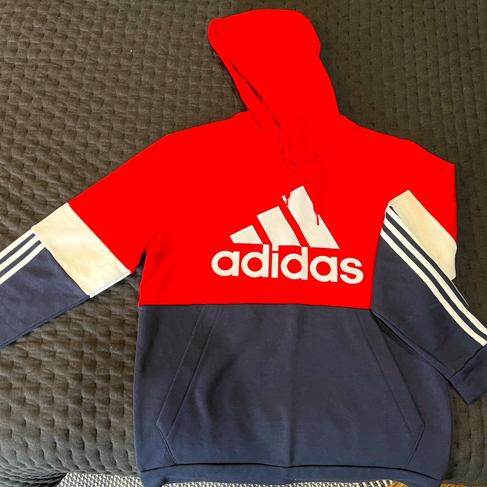 Men’s L adidas hoody, never worn. Color block blue/red w/classic 3 stripe sleeve